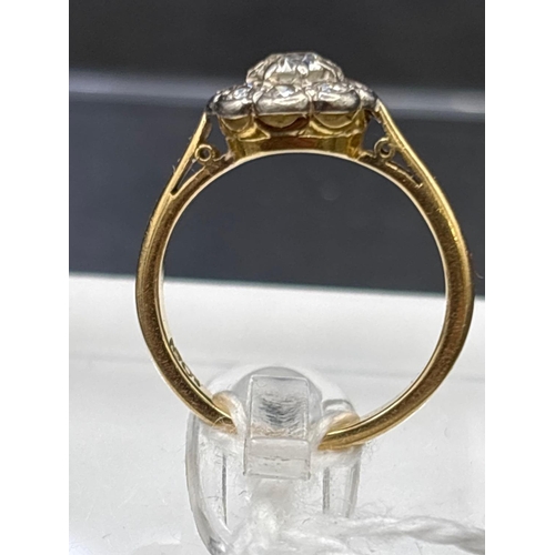 28 - Antique daisy diamond cluster ring in 18ct gold, size I