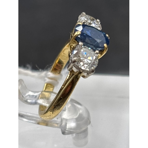 29 - 18ct Sapphire and diamond 3 stone ring, each diamond weighs 0.50cts, size H