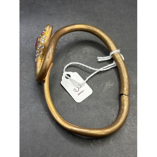 31 - A hinged snake head bracelet