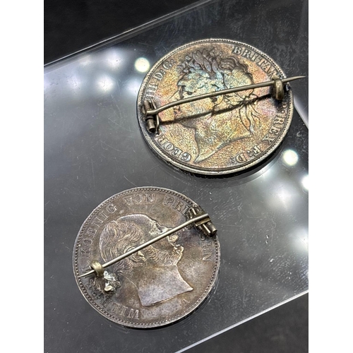 33 - Two enamelled coins