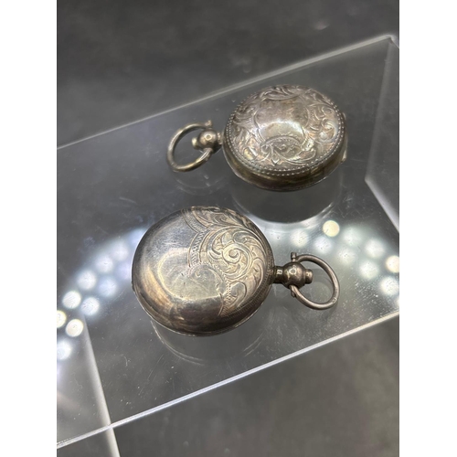 34 - Two silver sovereign cases