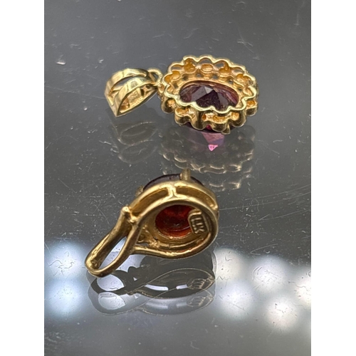 5 - Two red stone pendants