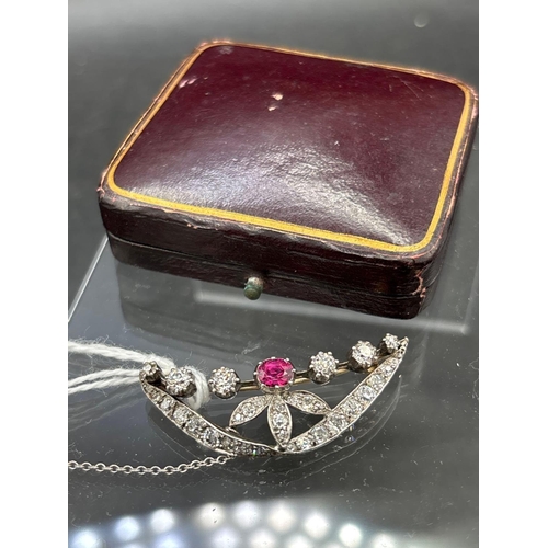 51 - A VICTORIAN RUBY DIAMOND SET GOLD BROOCH WITH SILVER SET OLD CUT AND CUSHION CUT DIAMONDS TOTAL WEIG... 