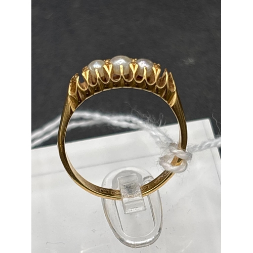 6 - A Victorian pearl ring 2 stones missing 18ct size R 4.2g