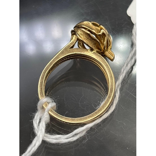66 - A FANCY GOLD SET RING SIZE Q 9.2 GMS