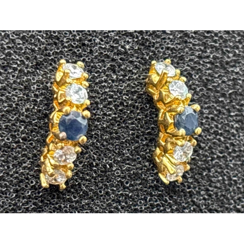 67 - A pair of attractive silver gilt sapphire and diamond earrings 3.4 gms