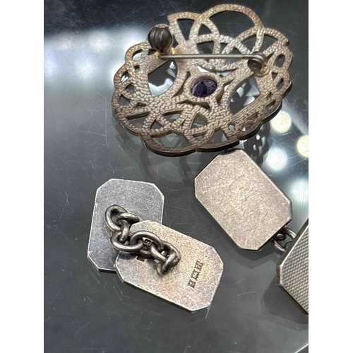68 - A silver Scottish style brooch and a pair of silver cufflinks