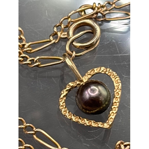 69 - A 14ct gold pearl heart pendant and a scrap gold neck chain 3 gms