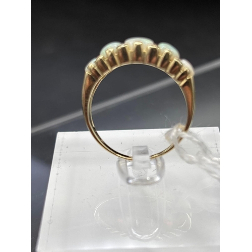 72 - A attractive five stone opal and diamond ring 9ct size R 3.2 gms in early ring box