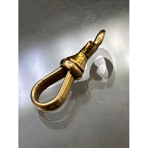 73 - A gold dog clip 14ct gold tested 1.8 gms