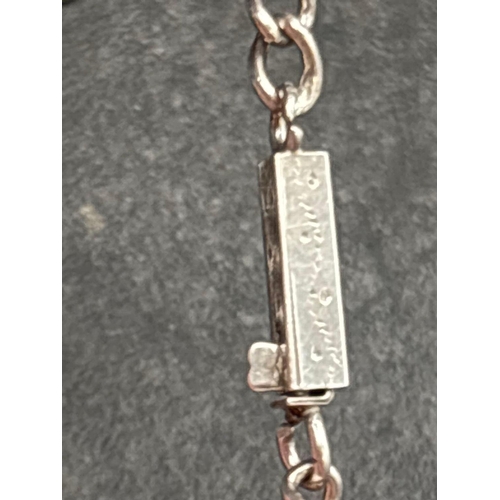 76 - A silver neck chain 16 inch