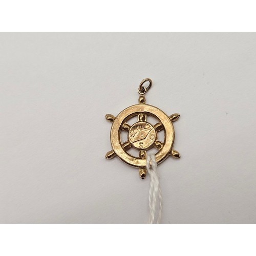 16 - An unusual ships wheel charm 9ct 2.1g
