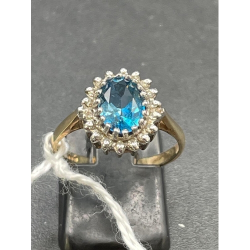 A topaz and diamond cluster ring 9ct size O 2.7 gms