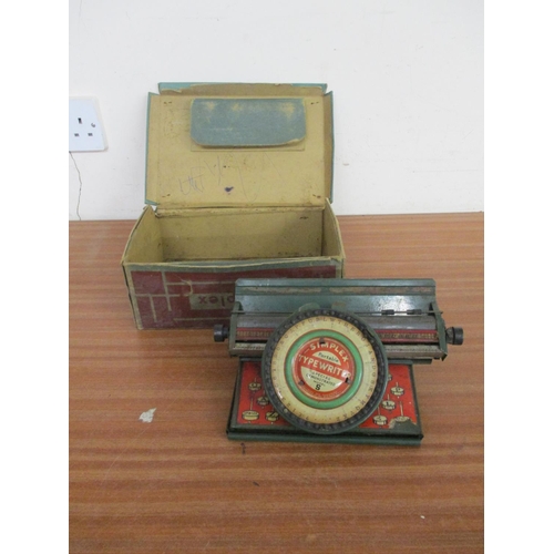 41 - A SIMPLEX TIN PLATE TYPEWRITER IN ORIGINAL BOX