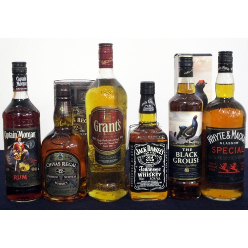 548 - 1 70-cl bt Captain Morgan Original Rum 1 70-cl bt Chivas Regal 12 YO Premium Scotch Whisky 40% oc 1 ... 