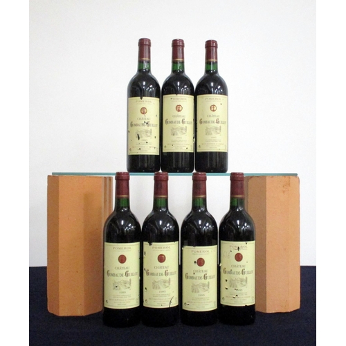 543 - 7 bts Ch. Gombaude-Guillot 1995  Pomerol  i.n, handwriting on labels, scuffed labels