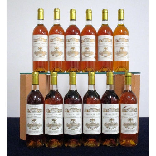 661 - 12 bts Ch. Filhot 1990 owc Sauternes, 2me Cru Classé  4 i.n, 8 vts, 2 vsl torn labels