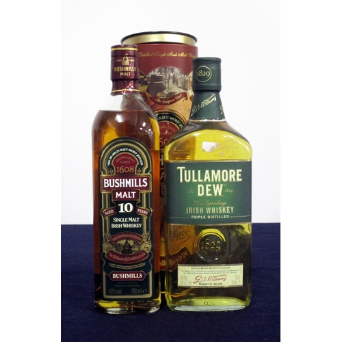 688 - 1 70-cl bt Bushmills 10 YO Single Malt Irish Whiskey 40% original tin 1 70-cl bt Tullamore Dew Tripl... 