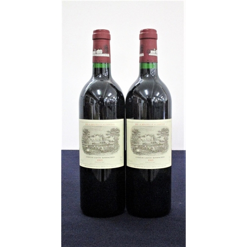 919 - 2 bts Ch. Lafite Rothschild 1995 Pauillac, 1er Cru Classé  hf, hf/i.n, vsl nick to edge of 1 label