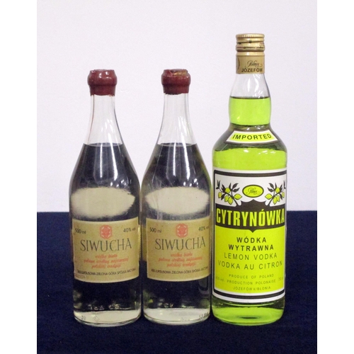 215 - v 2 50-cl bts Siwucha 'Old Style' Polish Vodka 40% 1 70-cl bt Polmos Cytrynówka Lemon Vodka 40% Abov... 