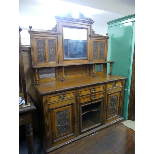 155 - A CARVED OAK MIRROR BACK SIDEBOARD, LABELLED JAMES SHOOLBRED & CO