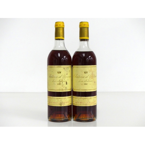 1077 - 2 bts Ch. D'Yquem 1983 Sauternes 1er Grand Cru Classé ms/us, ms, sl stl, vsl crusted foil