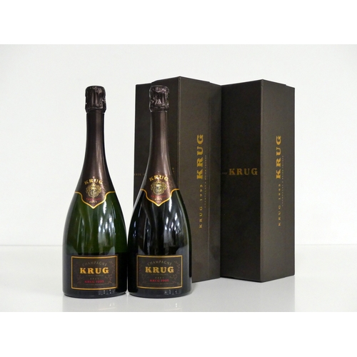 692 - 2 bts Krug Brut Vintage Champagne 1995 oc ind presentation cases