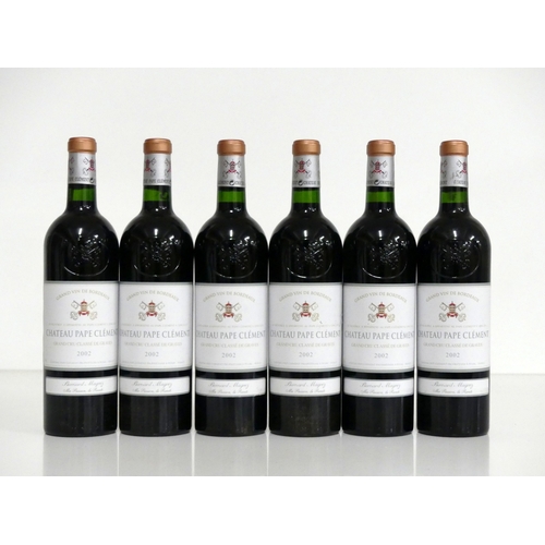 576 - 6 bts Ch. Pape Clément 2002 owc -(sl dam) Grand Cru Classé de Graves  i.n