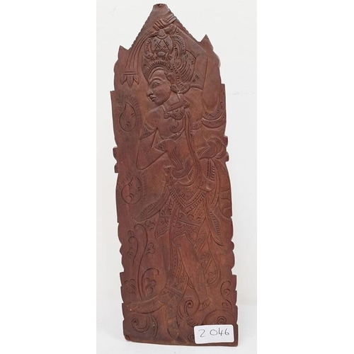 116 - Indian carved hardwood obelisk of deities and grotesque mask, 32cm high