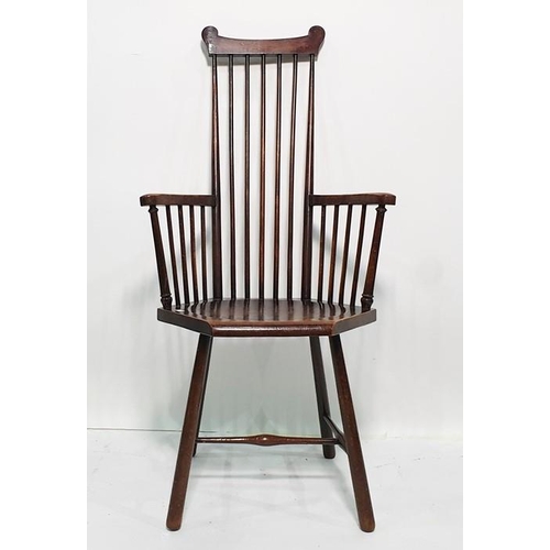 1187 - Circa 1920's stickback armchair, possibly J S Henry of London with carved top rail, stick back and t... 