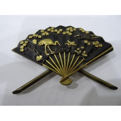 121 - Japanese bronze and gilt metal menu holder, fan-pattern and embossed with crane and water lilies, ea... 