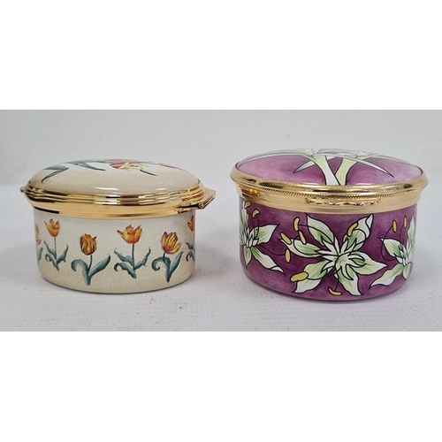 145 - Moorcroft enamel patchbox, circular, purple ground decorated with green flowers, 5.5cm diameter and ... 