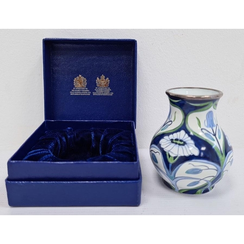 161 - Moorcroft miniature enamel vase, baluster-shaped, blue ground with bluebell and daisy decoration in ... 