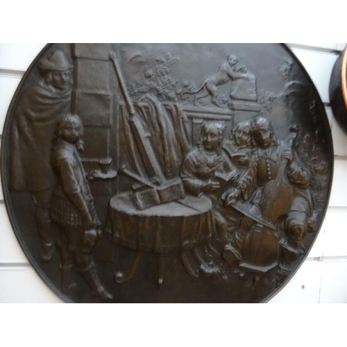 188 - Wall plaques of bronze effect relief,  depicting 18th century gentlemen playing musical instruments ... 