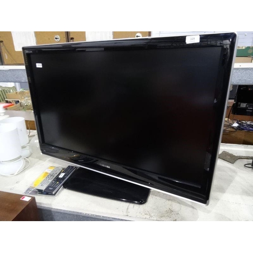 329 - Toshiba flatscreen television with remote