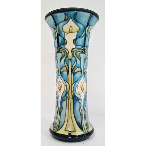 44 - William Moorcroft vase in cream, blue and greens with flared rim, marked ‘Moorcroft’ to base and dat... 