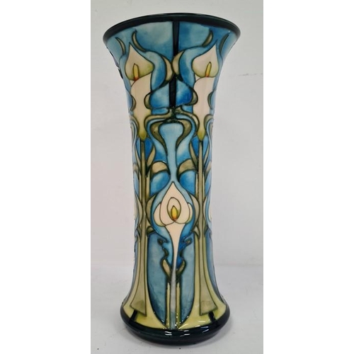 44 - William Moorcroft vase in cream, blue and greens with flared rim, marked ‘Moorcroft’ to base and dat... 