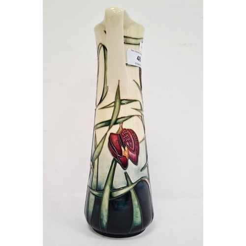 48 - Moorcroft ewer, cream ground with pink fritillary, signed ‘Philip Gibson 2001’, 24cm high