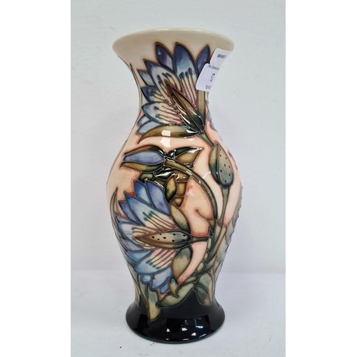 57 - Moorcroft vase, baluster shape, cream ground with blue flowers with green leaves, limited edition fo... 