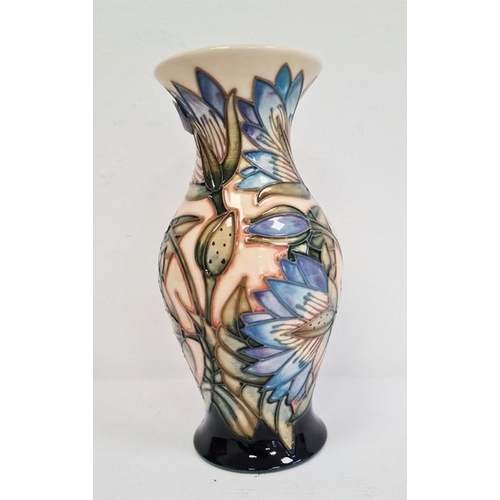 57 - Moorcroft vase, baluster shape, cream ground with blue flowers with green leaves, limited edition fo... 