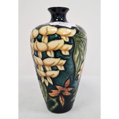 67 - Moorcroft vase, green leaf and white flower decoration, initialled ‘M.C.C.’ and dated 98, 19cm high