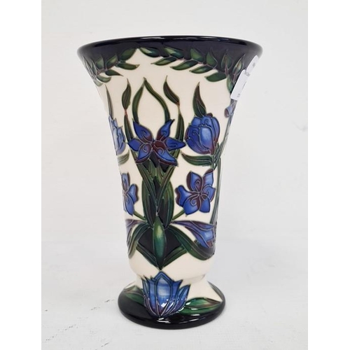 68 - Moorcroft vase, signed ‘S. Hayes’, cream ground, of flared form with blue flower decoration, 15cm hi... 