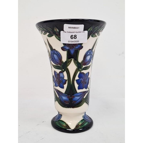 68 - Moorcroft vase, signed ‘S. Hayes’, cream ground, of flared form with blue flower decoration, 15cm hi... 