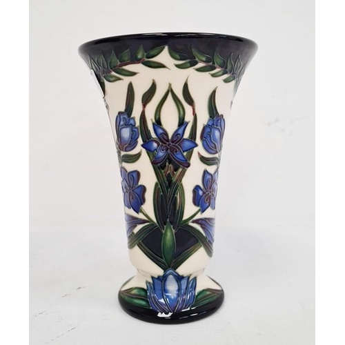 68 - Moorcroft vase, signed ‘S. Hayes’, cream ground, of flared form with blue flower decoration, 15cm hi... 