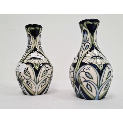 77 - Pair of Moorcroft pottery vases, each ovoid with slender neck, tube-lined decoration of convulvous a... 