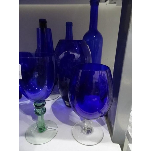 95 - Large quantity of Bristol Blue style glass vases, bottles, bowls, jug, etc and a set of eight glass ... 