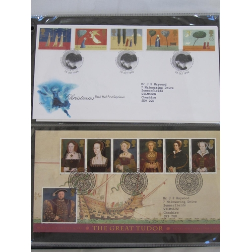 108 - Four albums of First Day Covers including The Queen's Golden Jubilee with crowns and some loose enve... 