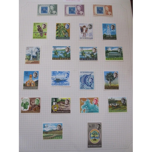 131 - Five albums of stamps, St Kitts-Nevis from 1st issues to circa 1980, Grenadines of St Vincent appear... 