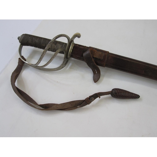 193 - George V Royal Artillery Officers sword with engraved decoration and leather scabbard