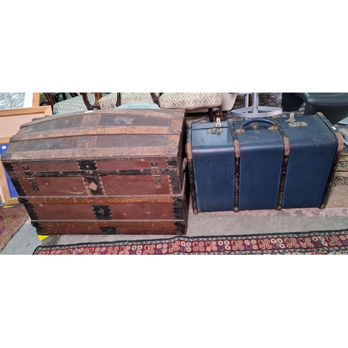 1405 - Brown leather covered dome-top trunk and one further trunk and contents (2)